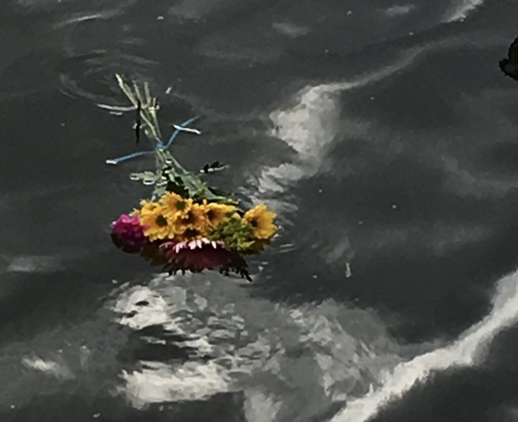 Bouquet of flowers floating on water